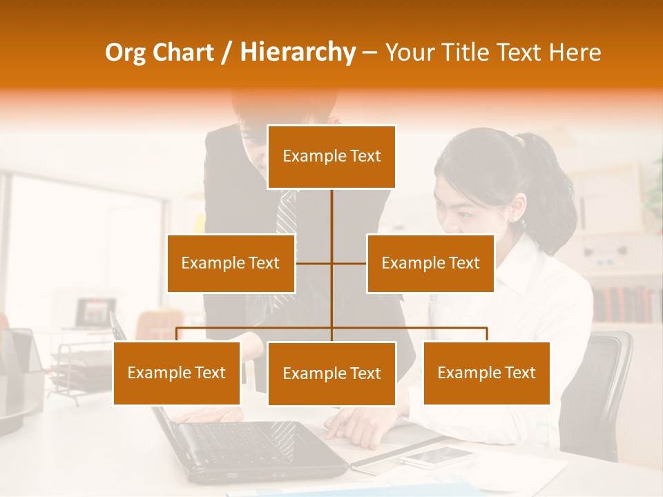 A Couple Of People That Are Looking At A Laptop PowerPoint Template