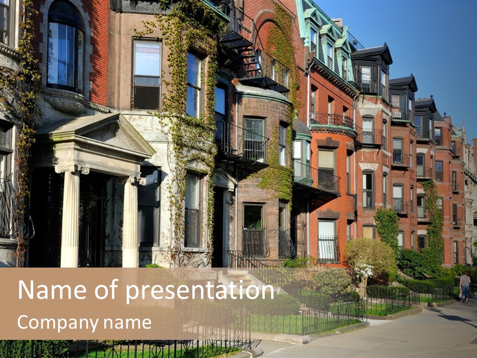A Row Of Houses With A Fence In Front Of Them PowerPoint Template