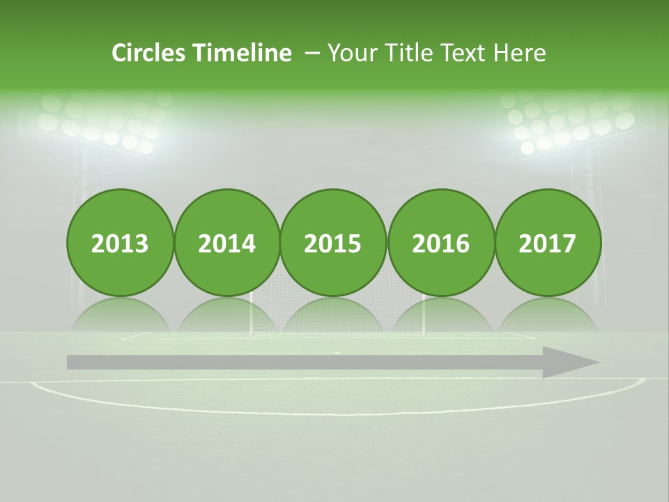 A Soccer Field With A Goal And Lights On It PowerPoint Template