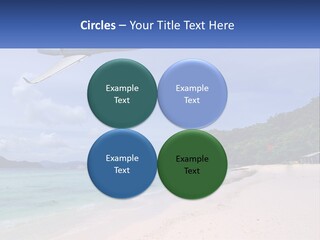 A Plane Is Flying Over A Beach With Clear Water PowerPoint Template