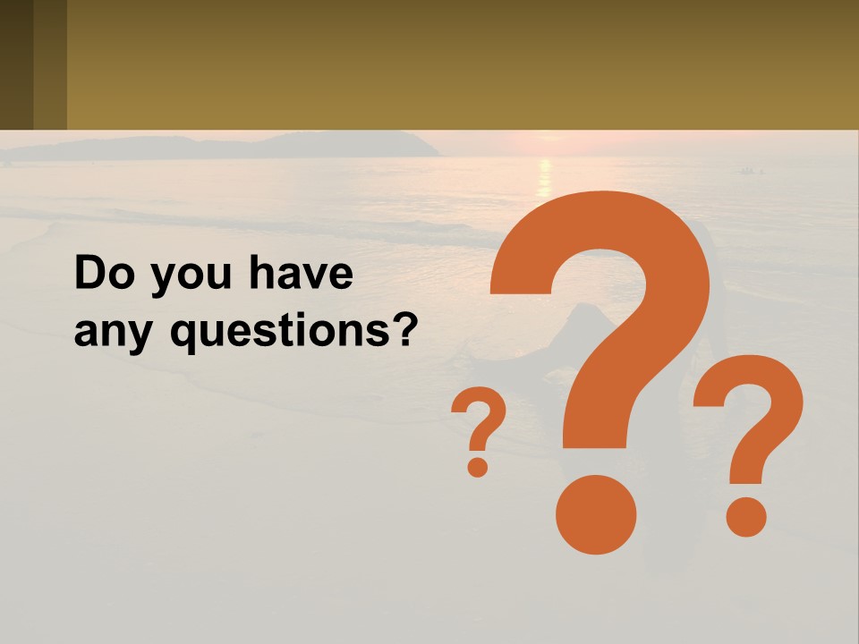 A Woman Is Sitting On The Beach At Sunset PowerPoint Template