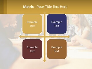 A Group Of People Sitting Around A Conference Table PowerPoint Template