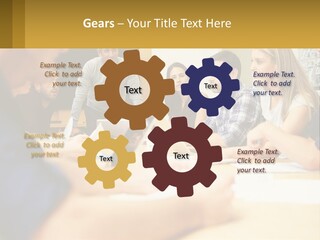 A Group Of People Sitting Around A Conference Table PowerPoint Template