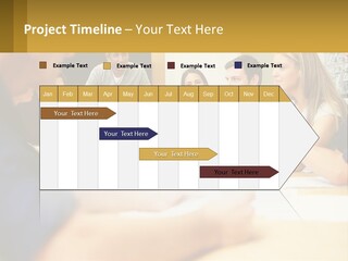 A Group Of People Sitting Around A Conference Table PowerPoint Template