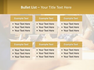 A Group Of People Sitting Around A Conference Table PowerPoint Template