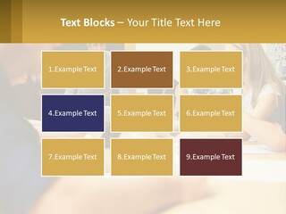 A Group Of People Sitting Around A Conference Table PowerPoint Template