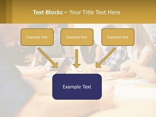 A Group Of People Sitting Around A Conference Table PowerPoint Template