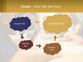 A Group Of People Sitting Around A Conference Table PowerPoint Template