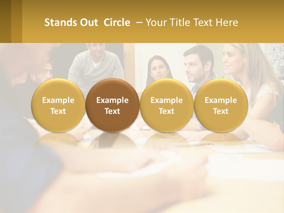 A Group Of People Sitting Around A Conference Table PowerPoint Template