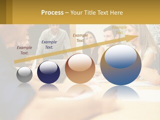 A Group Of People Sitting Around A Conference Table PowerPoint Template