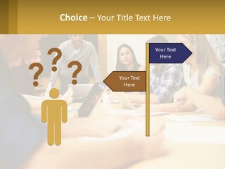 A Group Of People Sitting Around A Conference Table PowerPoint Template