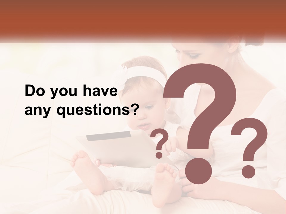 A Woman Holding A Baby While Looking At A Tablet PowerPoint Template