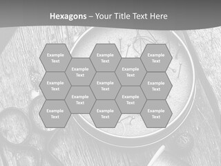 A Black And White Photo Of Scissors And A Hat On A Wooden Table PowerPoint Template