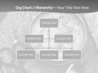 A Black And White Photo Of Scissors And A Hat On A Wooden Table PowerPoint Template