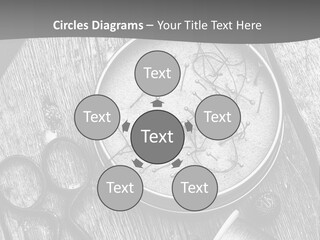 A Black And White Photo Of Scissors And A Hat On A Wooden Table PowerPoint Template