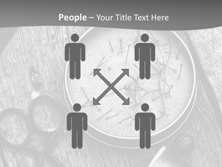 A Black And White Photo Of Scissors And A Hat On A Wooden Table PowerPoint Template