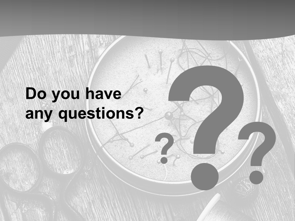 A Black And White Photo Of Scissors And A Hat On A Wooden Table PowerPoint Template