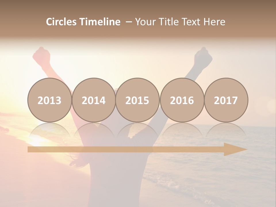 A Person Standing On A Beach With Their Arms In The Air PowerPoint Template