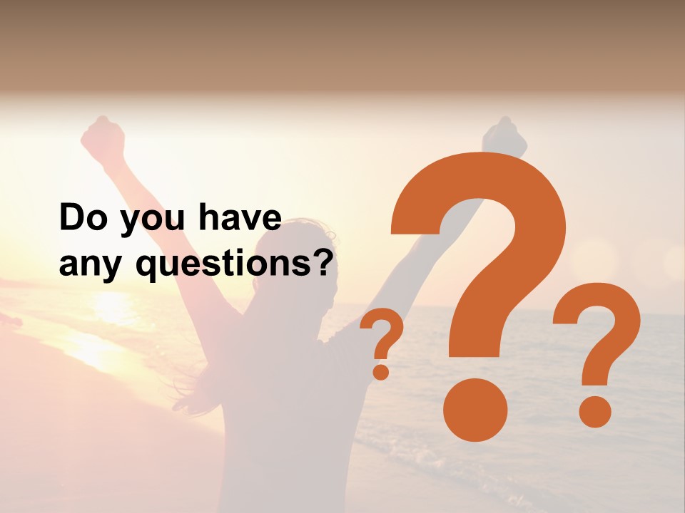 A Person Standing On A Beach With Their Arms In The Air PowerPoint Template