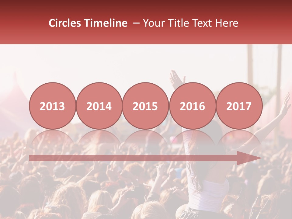 A Large Crowd Of People At A Music Festival PowerPoint Template