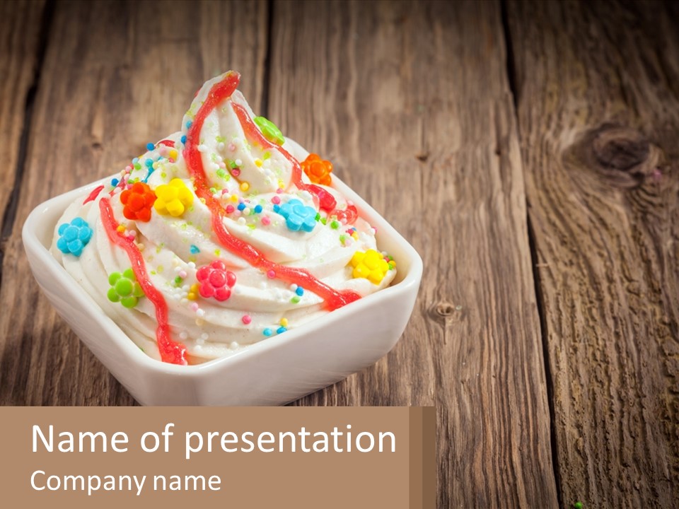 A Bowl Of Ice Cream With Sprinkles On A Wooden Table PowerPoint Template