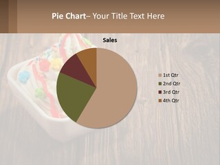 A Bowl Of Ice Cream With Sprinkles On A Wooden Table PowerPoint Template