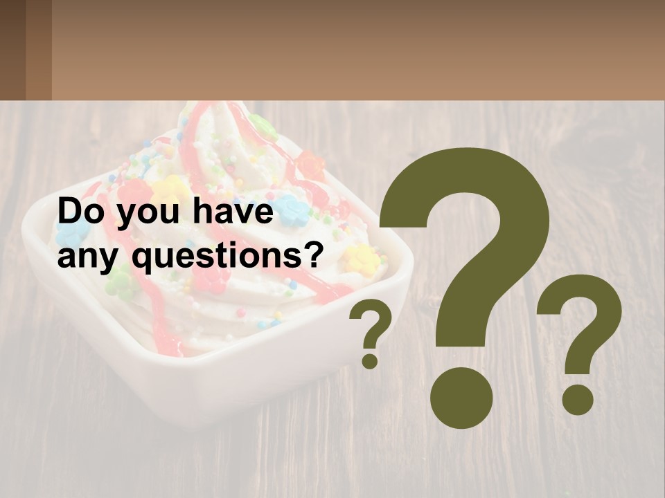 A Bowl Of Ice Cream With Sprinkles On A Wooden Table PowerPoint Template