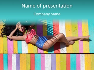 A Woman In A Bikini Laying On A Colorful Wall PowerPoint Template