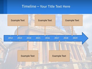 A Large Building With Columns And A Clock On It PowerPoint Template