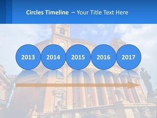 A Large Building With Columns And A Clock On It PowerPoint Template