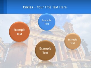 A Large Building With Columns And A Clock On It PowerPoint Template