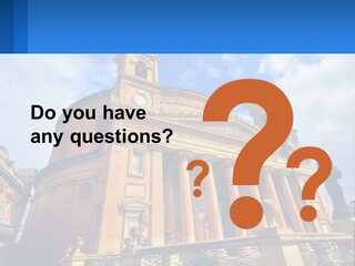 A Large Building With Columns And A Clock On It PowerPoint Template