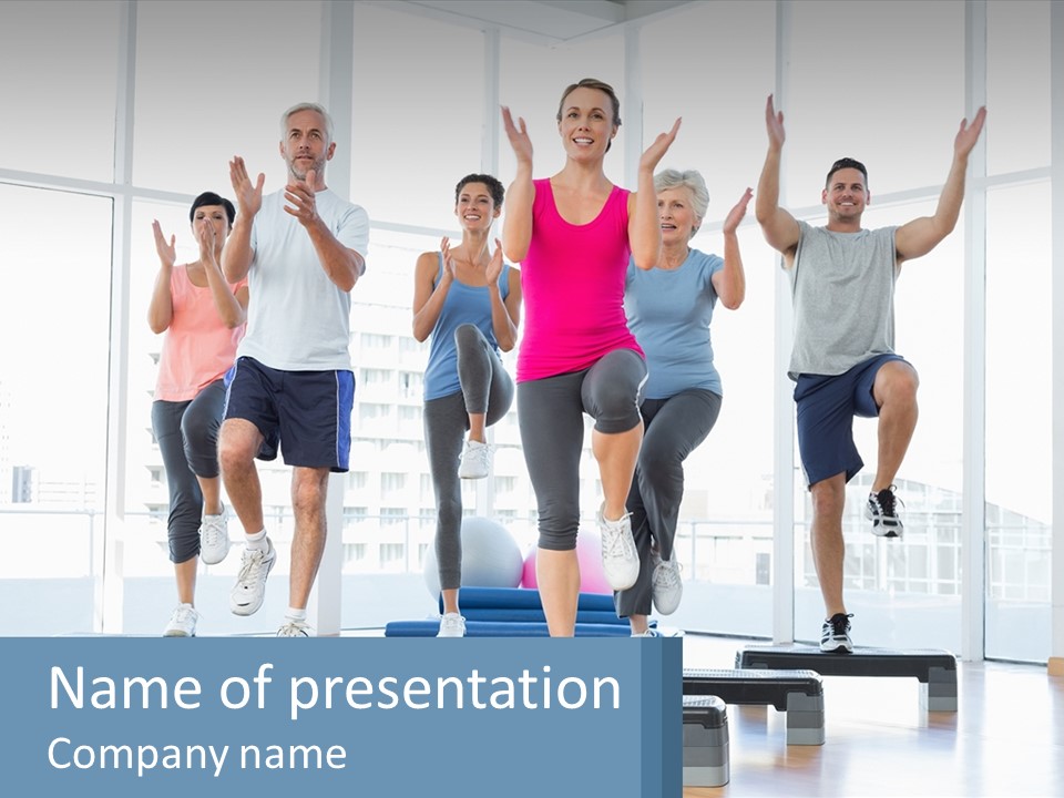 A Group Of People Doing Exercises In A Gym PowerPoint Template