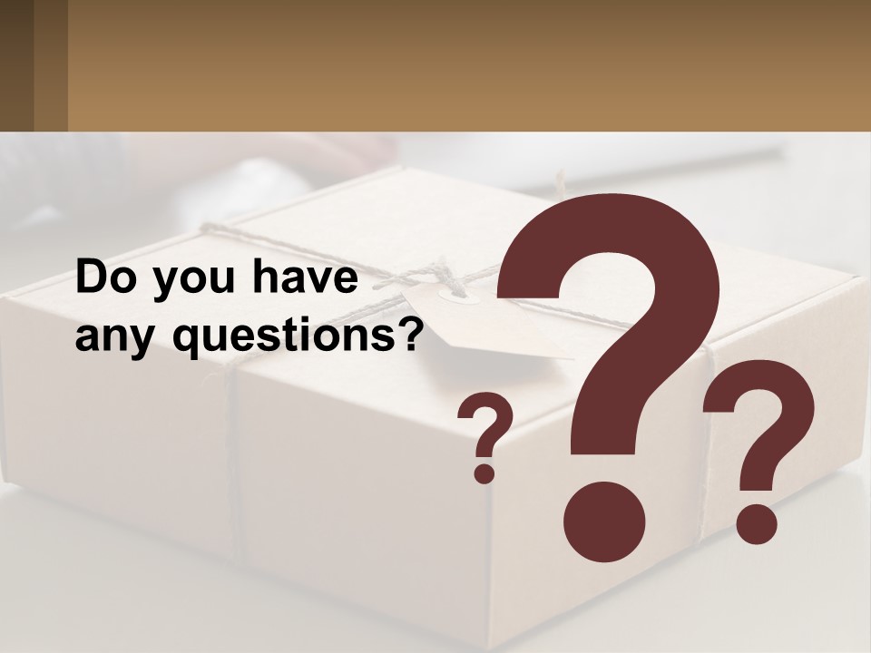 A Person Writing On A Piece Of Paper Next To A Wrapped Present Box PowerPoint Template