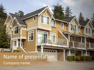 A Large House With A Lot Of Windows And Balconies PowerPoint Template