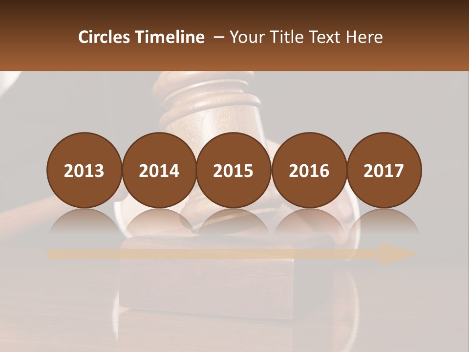 A Wooden Judge's Hammer On Top Of A Wooden Table PowerPoint Template