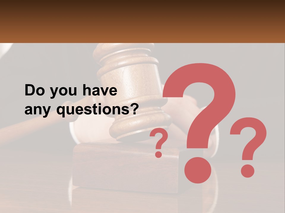 A Wooden Judge's Hammer On Top Of A Wooden Table PowerPoint Template