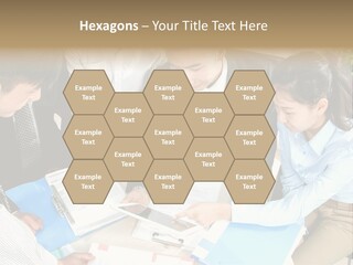 A Group Of People Sitting Around A Table With Papers PowerPoint Template