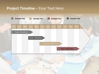 A Group Of People Sitting Around A Table With Papers PowerPoint Template