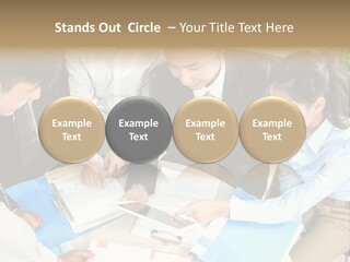 A Group Of People Sitting Around A Table With Papers PowerPoint Template