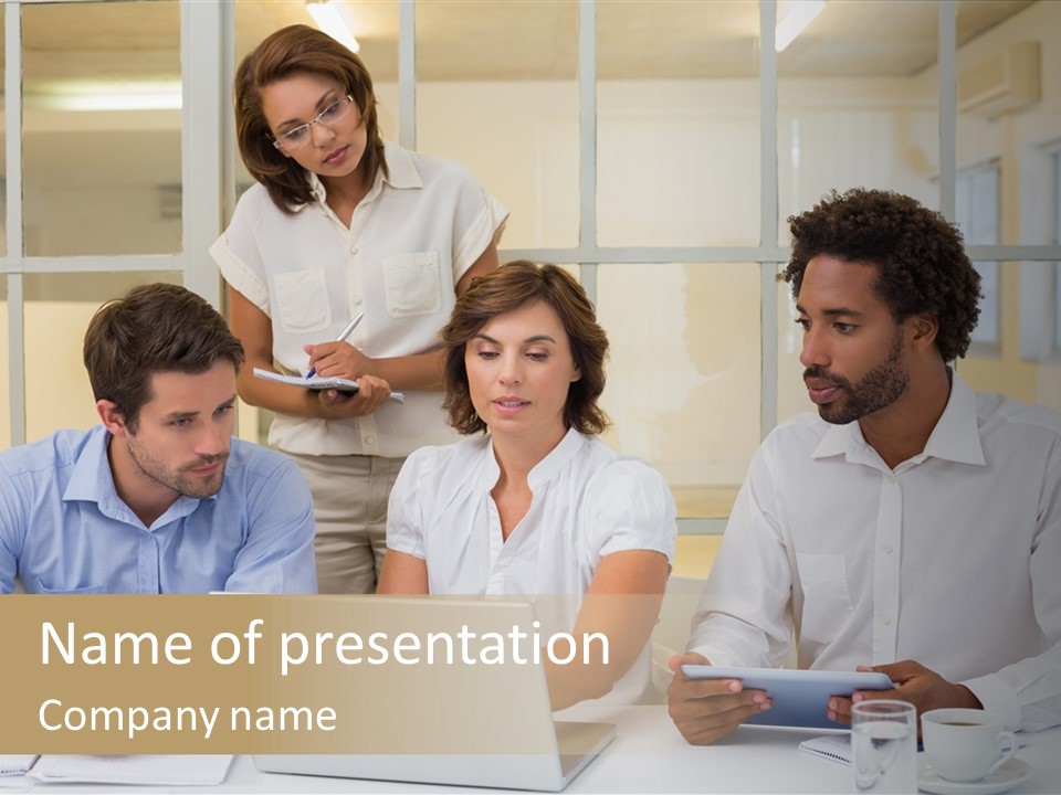A Group Of People Sitting Around A Laptop Computer PowerPoint Template