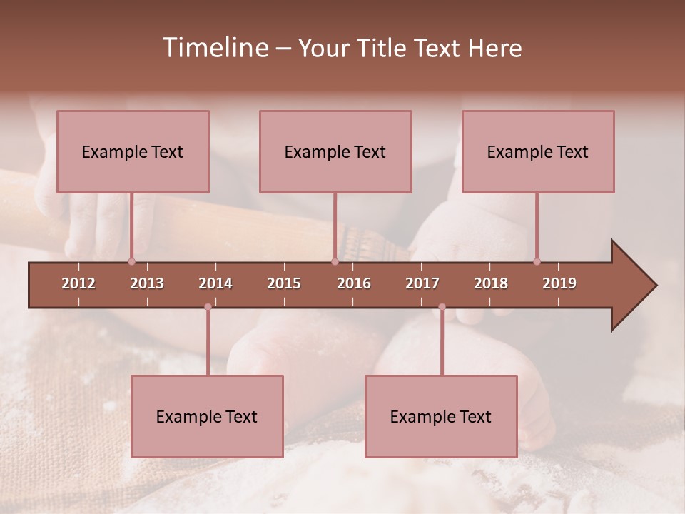 A Baby Holding A Rolling Pin On Top Of A Table PowerPoint Template