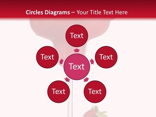 A Red Drink With Strawberries On The Rim PowerPoint Template