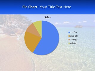 A Beach With A Boat In The Water PowerPoint Template