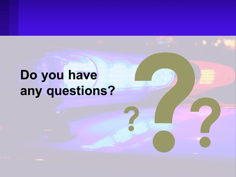 A Police Car With Its Lights On At Night PowerPoint Template