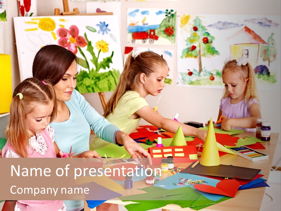 A Group Of Children Sitting Around A Table PowerPoint Template