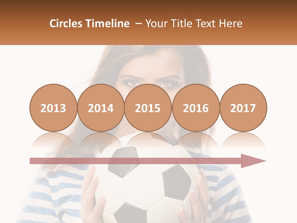 A Woman Holding A Soccer Ball In Her Hands PowerPoint Template