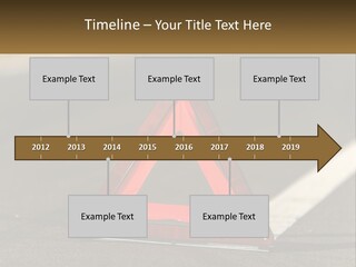 A Red Triangle Sign Sitting On The Side Of A Road PowerPoint Template