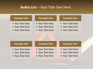 A Red Triangle Sign Sitting On The Side Of A Road PowerPoint Template