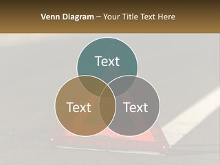 A Red Triangle Sign Sitting On The Side Of A Road PowerPoint Template